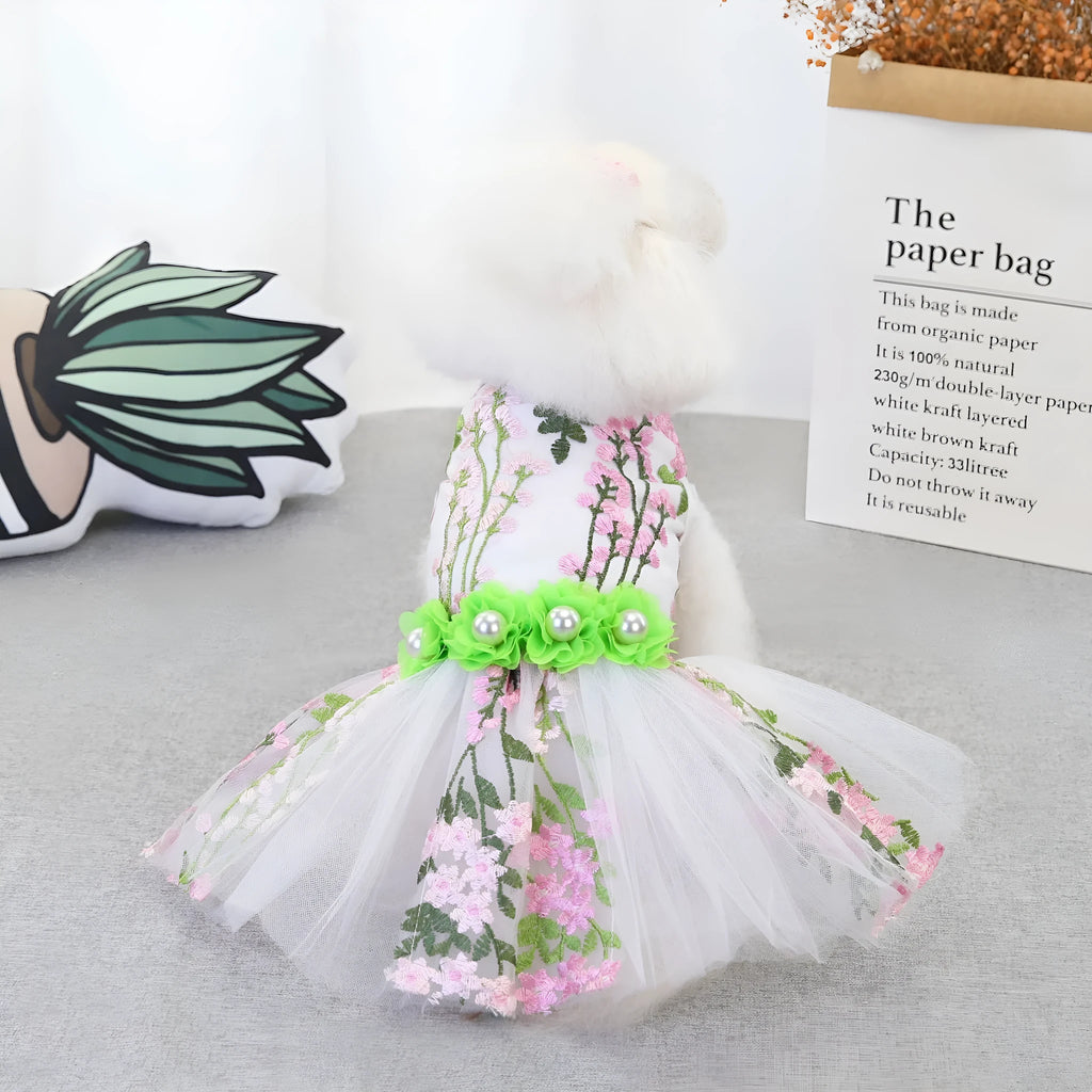 Cotton dog wedding dress in multi-leaf pink princess style on a small dog