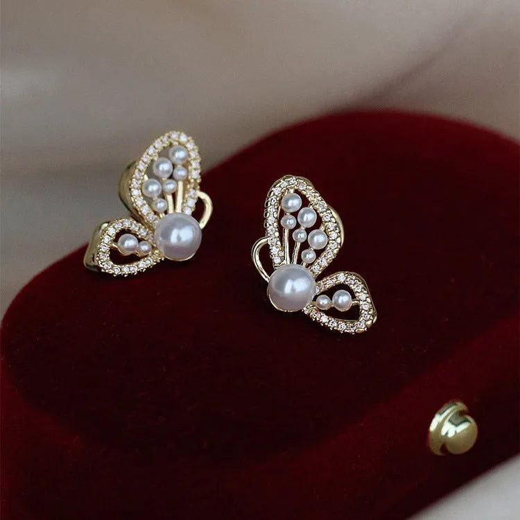 Copper butterfly pearl stud earrings with gold plating and zircon for women