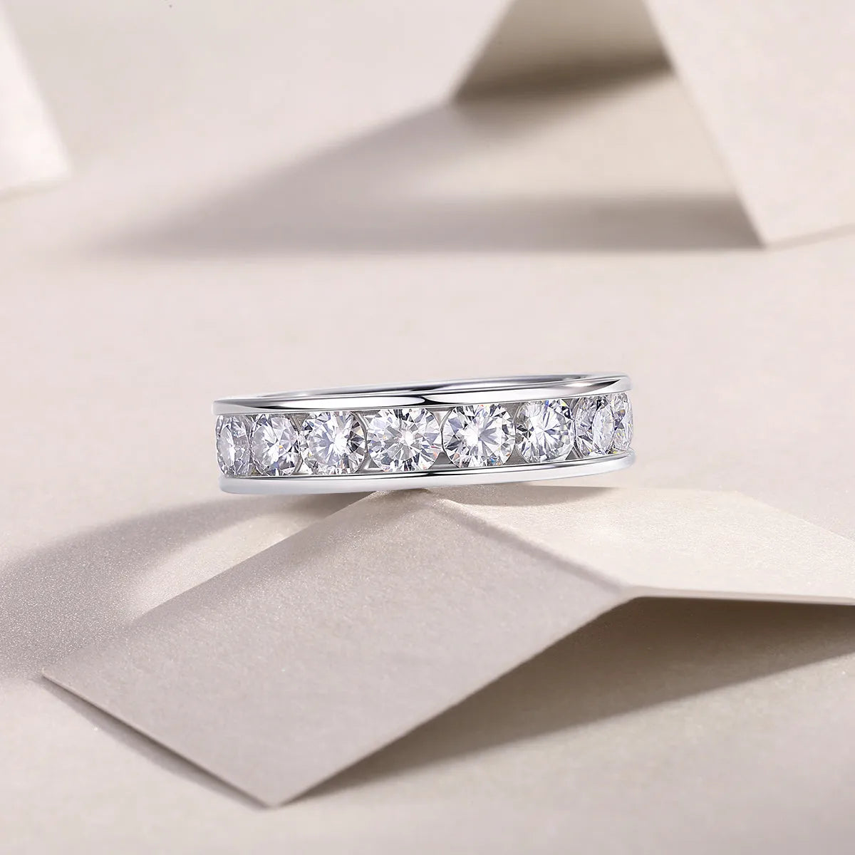 Large star moissanite wedding ring in S925 silver with platinum plating on white background