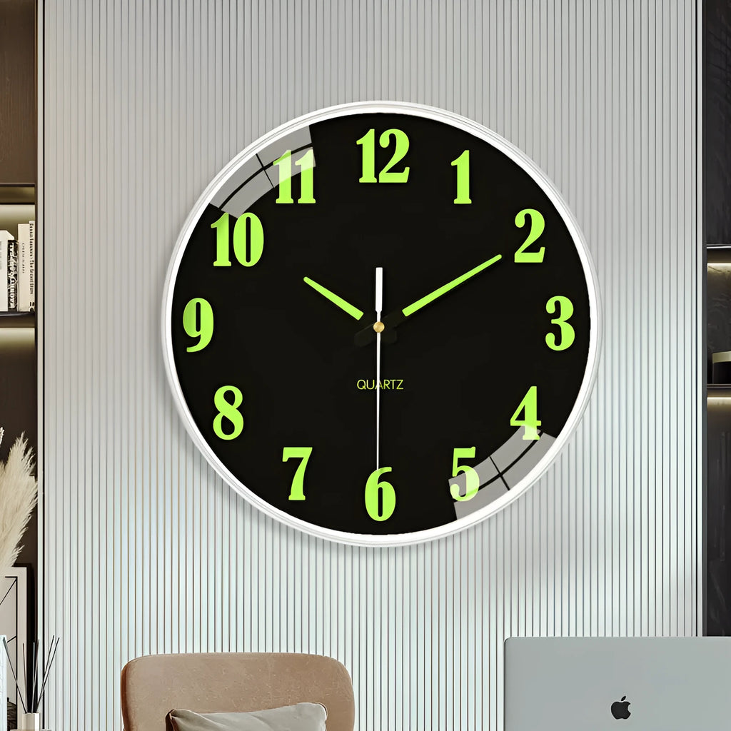 Modern 8-inch luminous wall clock with white face and black numbers on a wall.