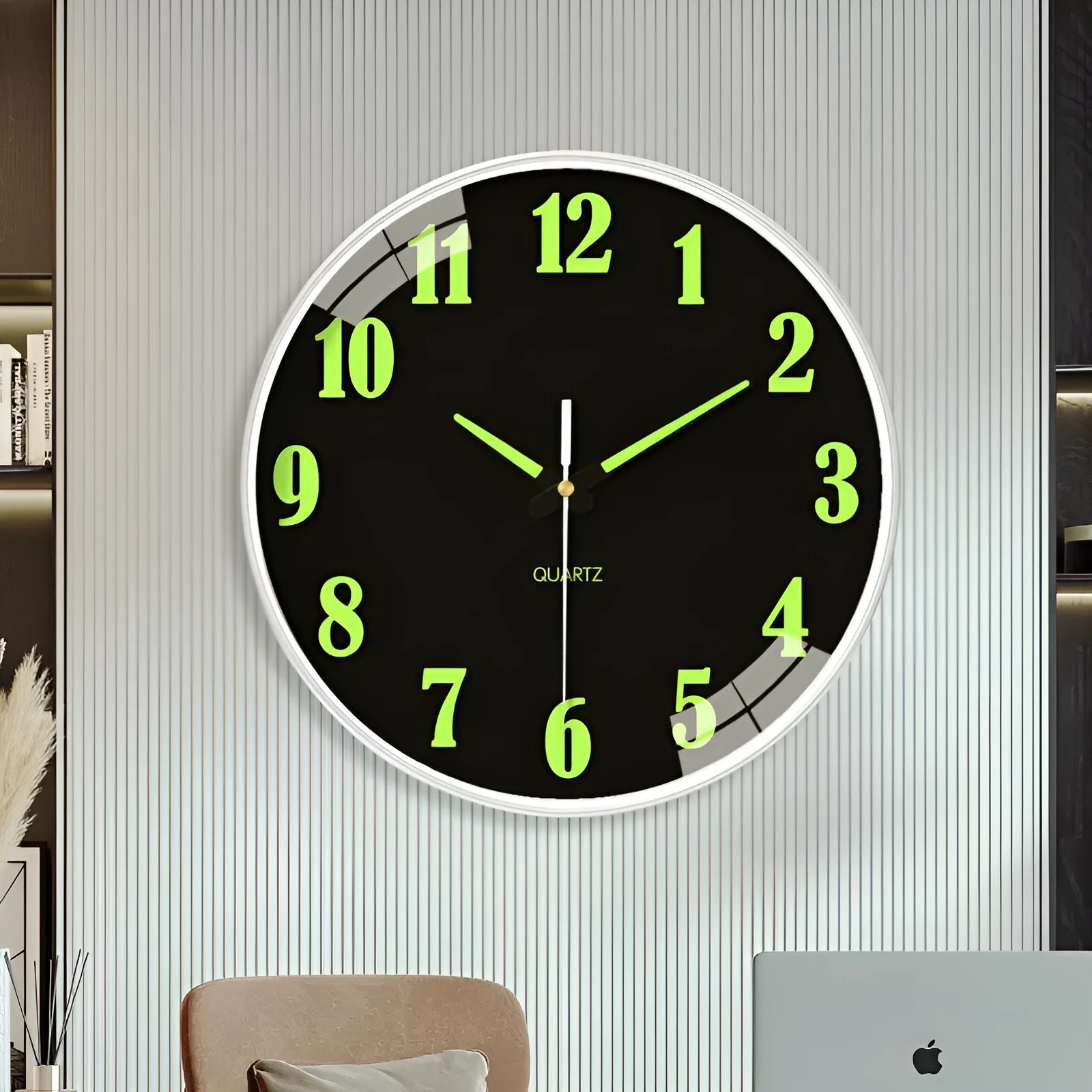 Modern 8-inch luminous wall clock with white face and black numbers on a wall.
