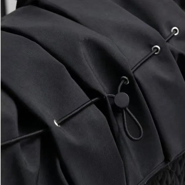 Black polyester one-shoulder insulated waterproof bag with curved strap and woven detailing