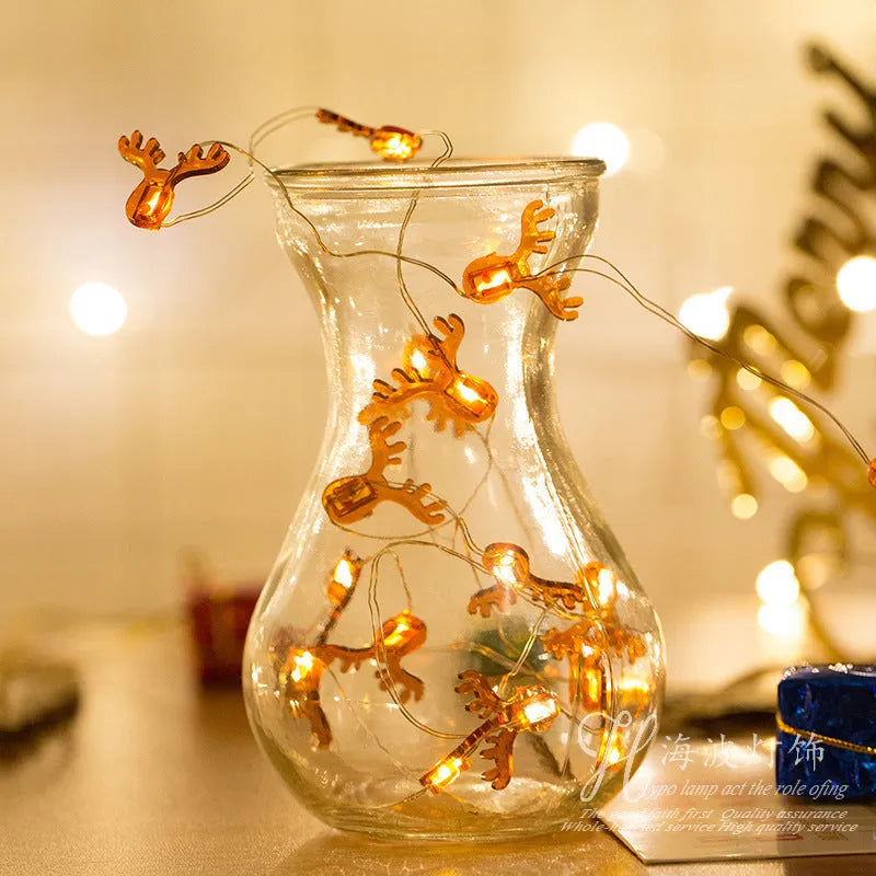 30 warm white LED copper wire string lights with 2 metre length and battery box, six festive shapes on display