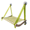 Green wooden cat window hammock with suction cups attached to glass, showing a removable linen mat.