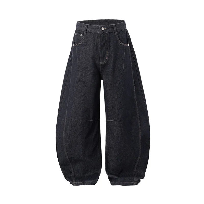 Men's wide leg denim trousers in original cow colour showing relaxed fit and mid waist design.
