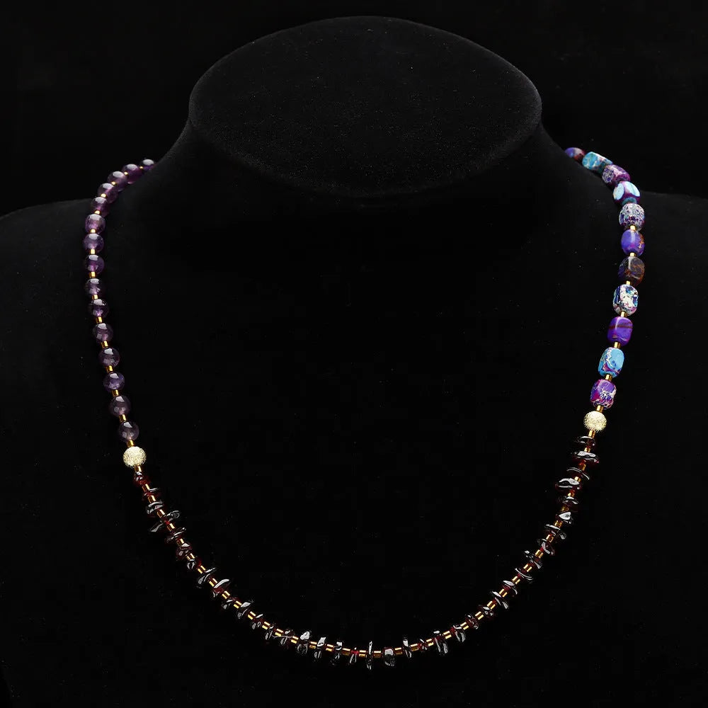 Purple amethyst and garnet round stone bead bracelet with geometric shapes