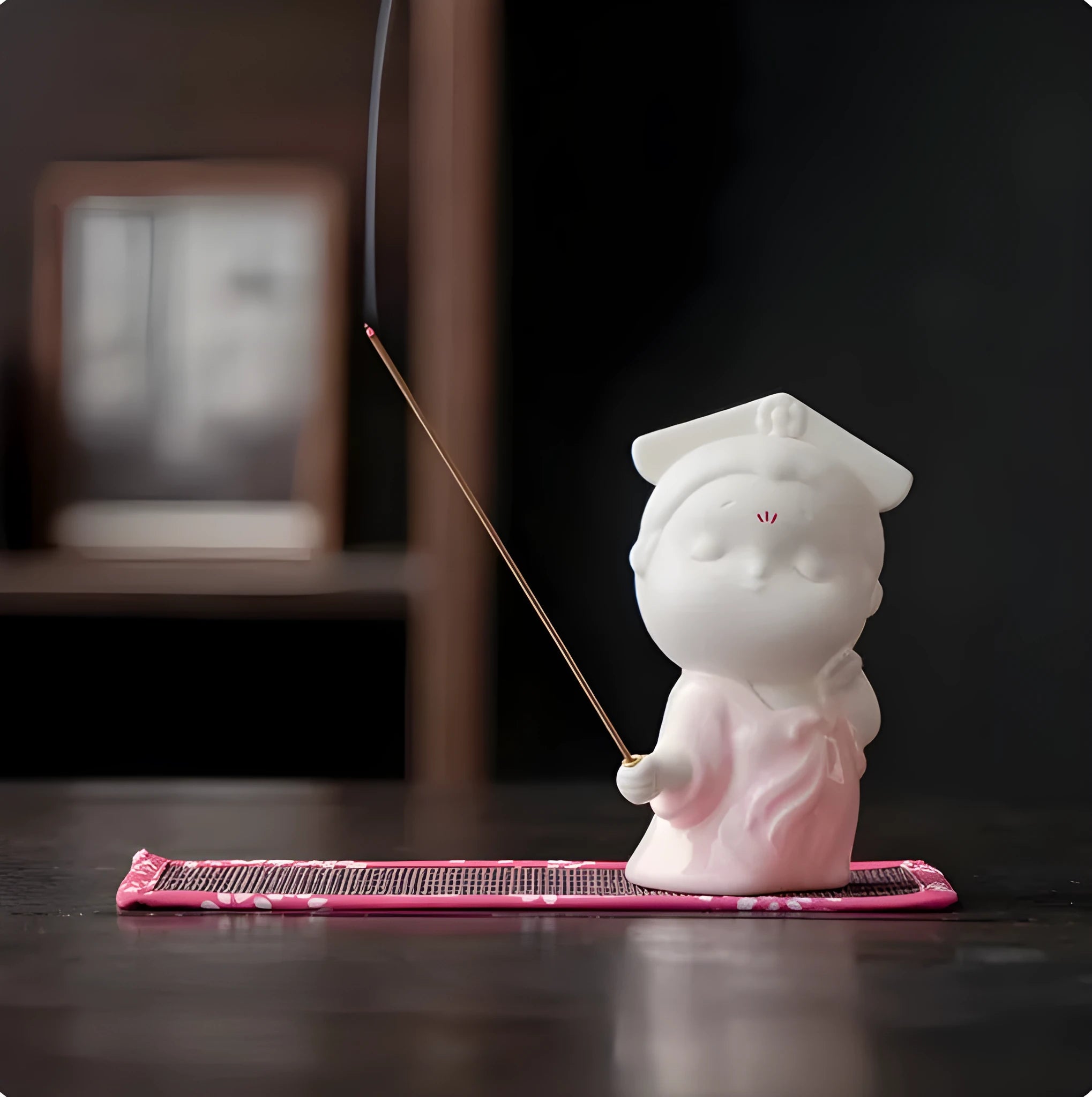 Ceramic little female court attendant figurine incense burner decoration in a floral pattern.