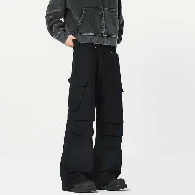 Men's beige straight-leg casual trousers with a high waist and button-fly front on a neutral background.