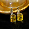 Square crystal drop earrings made from copper in purple, red, or yellow colours measuring 25mm by 10mm