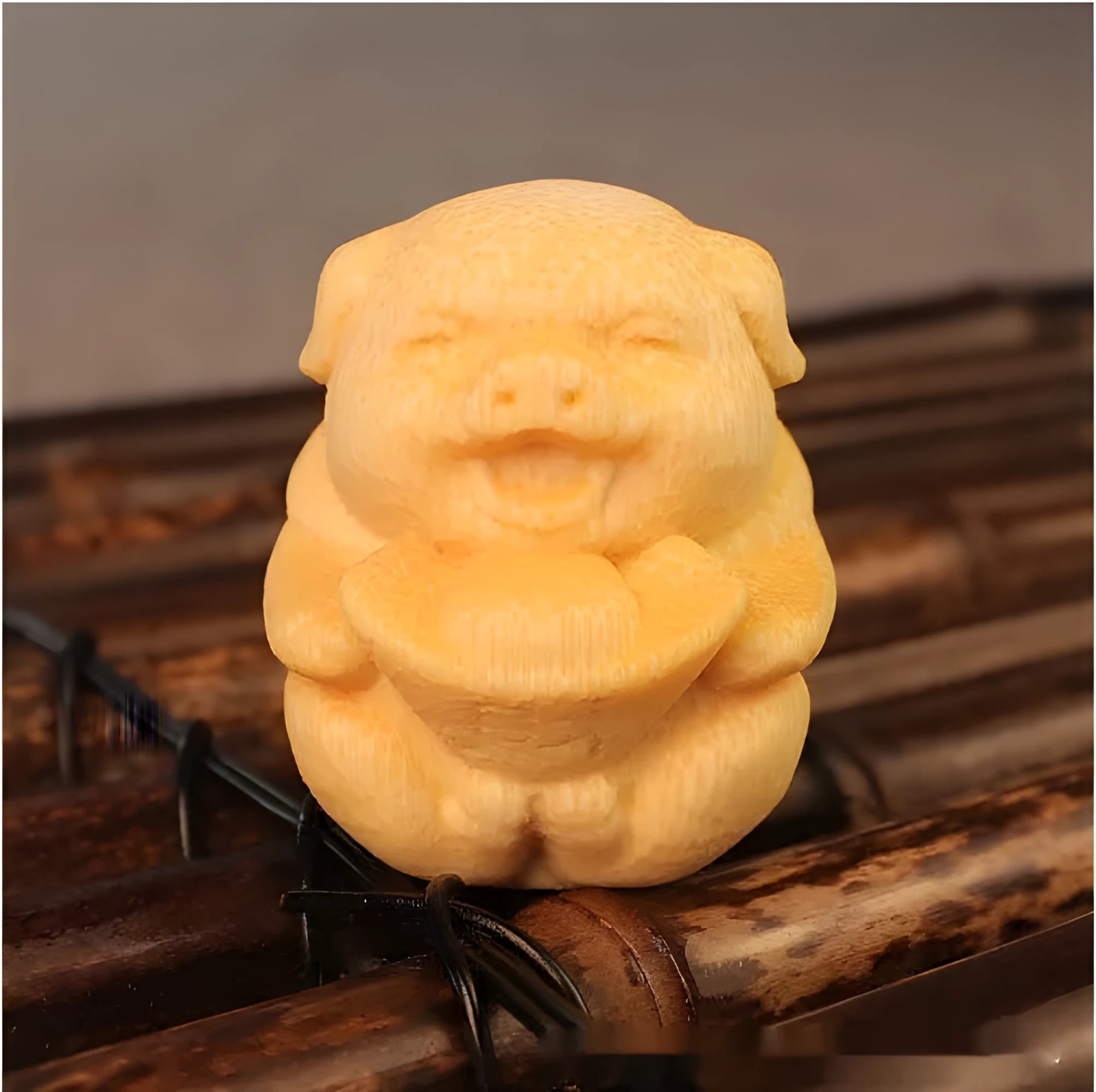 Solid bamboo carving ornament with cute pig design measuring 4cm tall by 3.5cm diameter