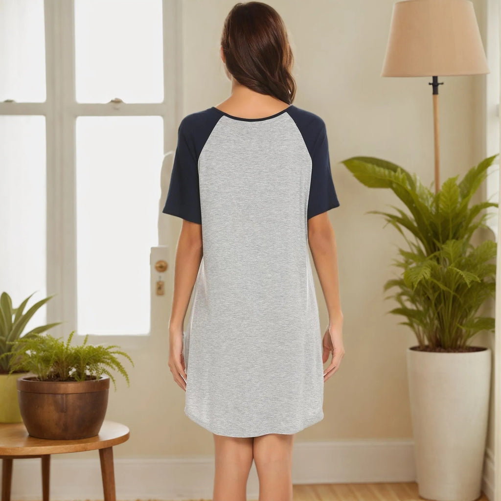 Women's colour contrast patchwork nightdress with navy blue sleeves on a hanger