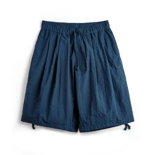 Men's embroidered beach shorts in Prussian Blue with loose fit design