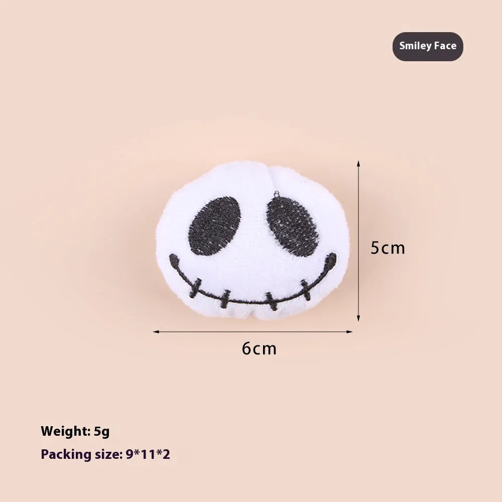 Small plush cat teaser wand toy on a white background, showing eye, candy, and skull design options.