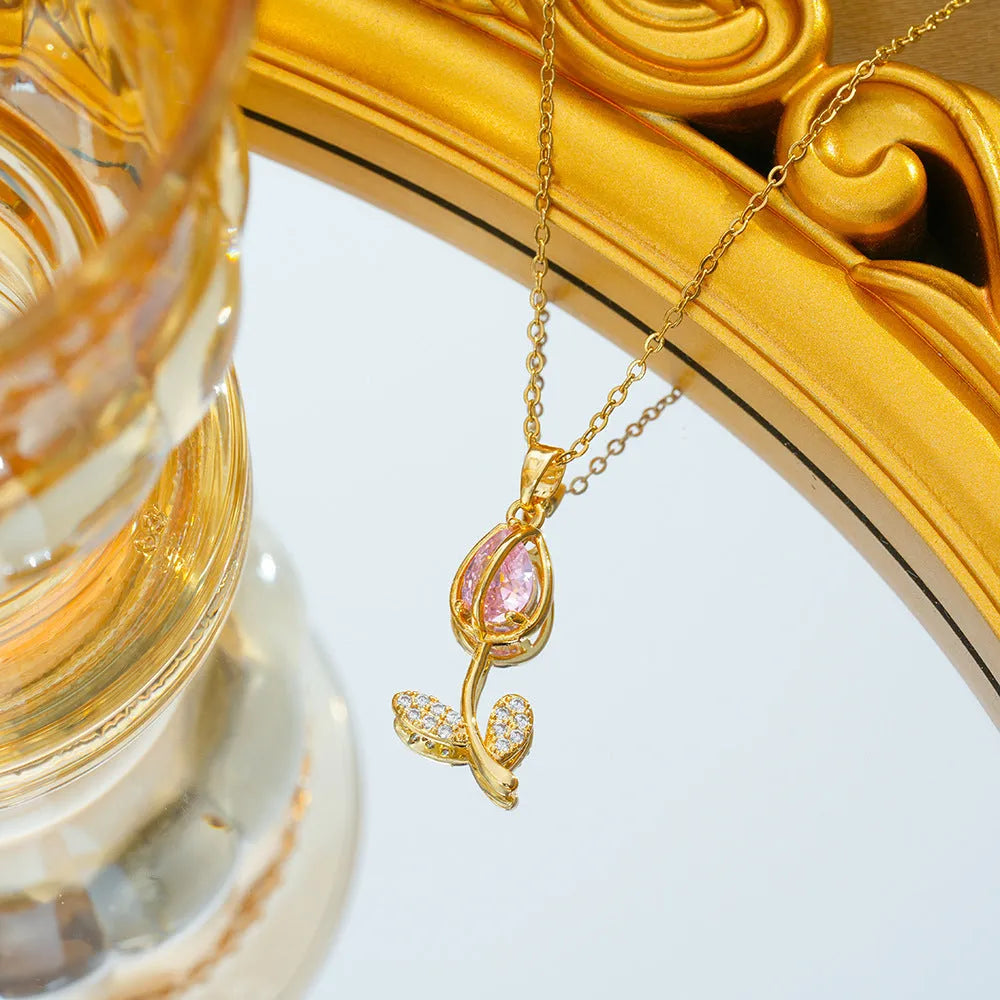 Gold zircon tulip flower necklace for women on a titanium steel chain, showing colour variations.