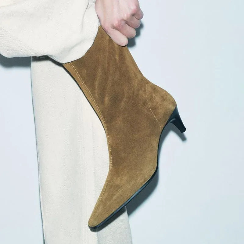 Brown square toe mid-heel ankle boot with side zipper and waterproof platform sole.