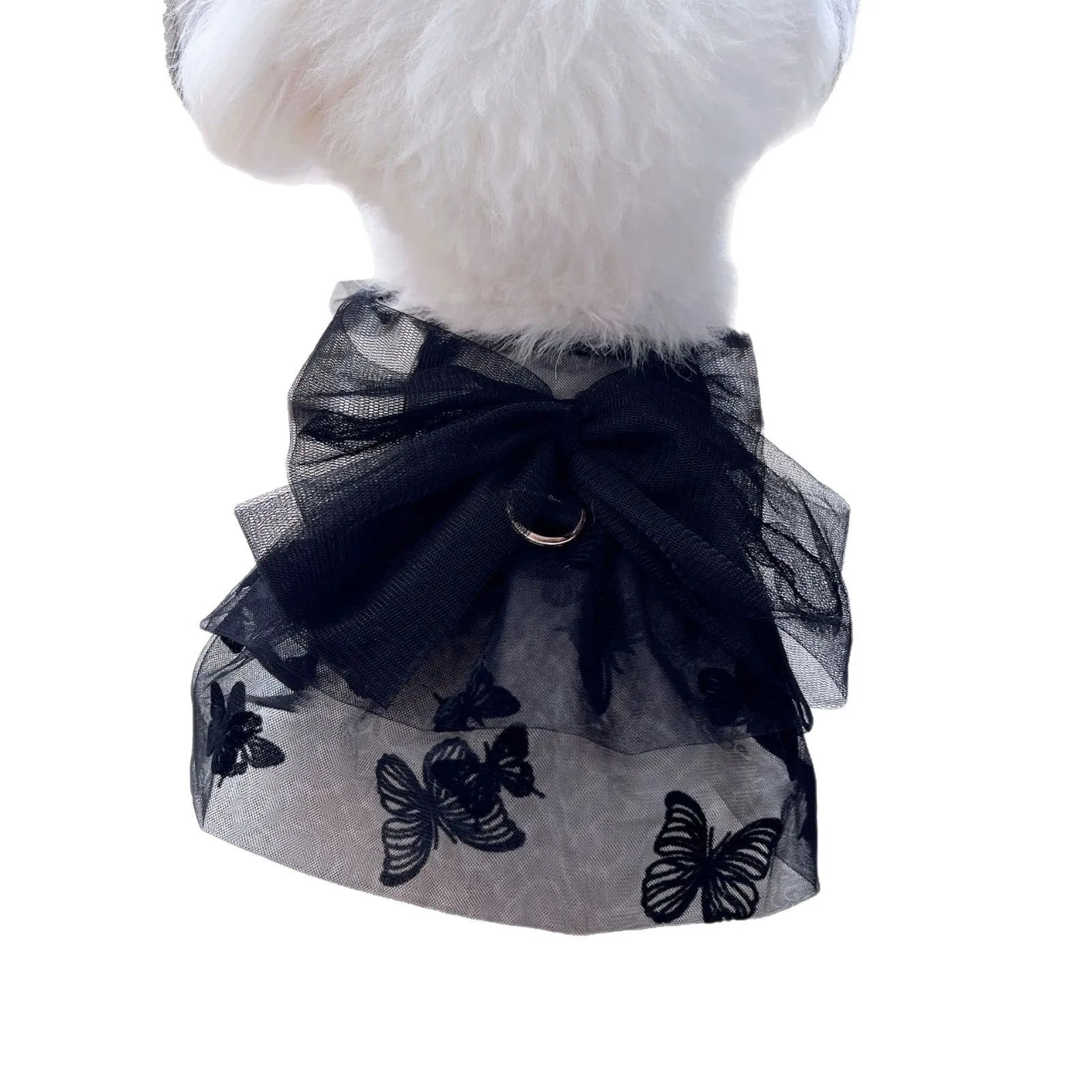 Black tiered tulle princess skirt on a small dog, showing the gauze layers and fit.