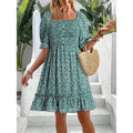 Women's printed puff sleeve backless dress in blue with lace-up and patchwork details, mid-length polyester dress
