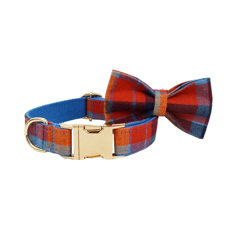 Blue velvet plaid dog collar with integrated hand-holding rope and leash set on cloth material