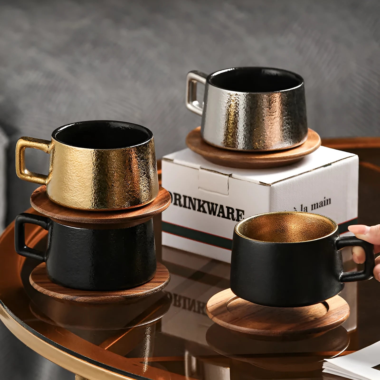 Gold and silver plated gift boxes with a solid colour 250ml tumbler coffee cup inside.