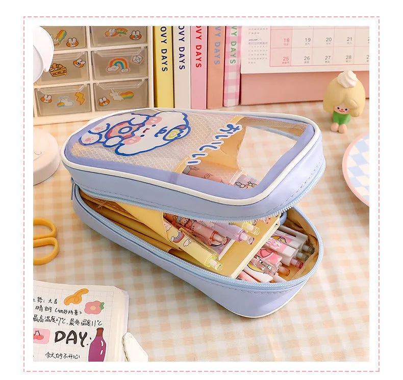 Large transparent PVC pencil case with a vertical cartoon dog design, zippered closure.