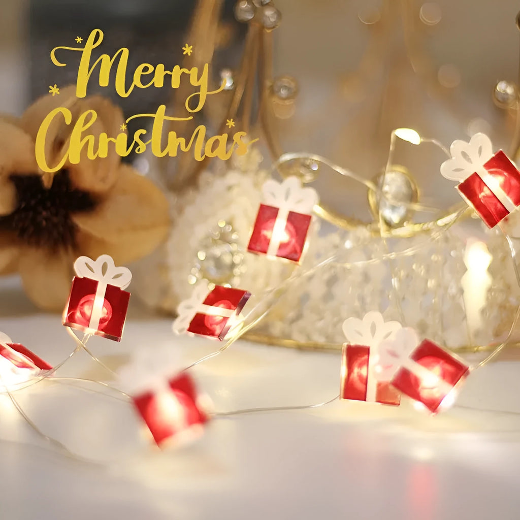 30 warm white LED copper wire string lights with 2 metre length and battery box, six festive shapes on display