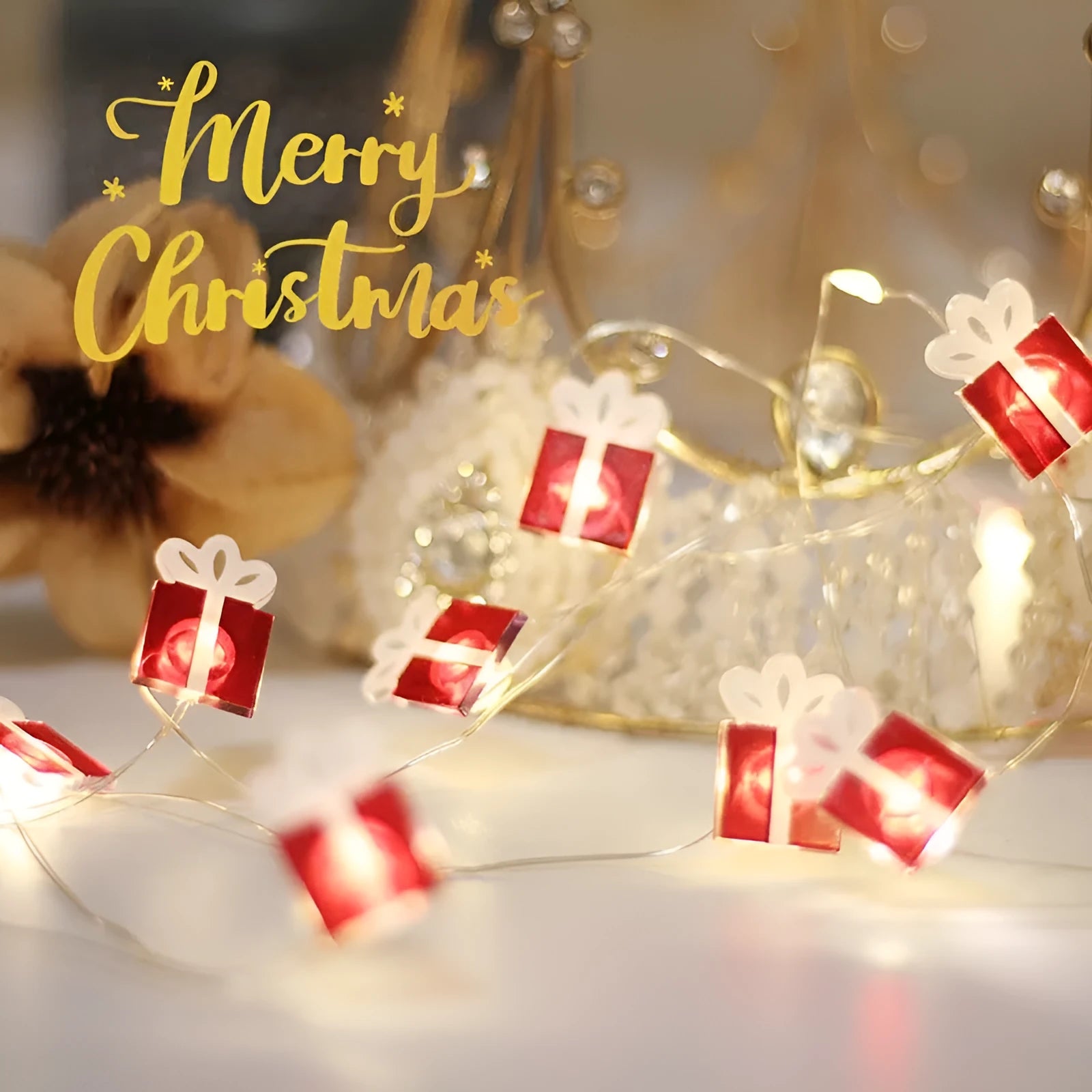30 warm white LED copper wire string lights with 2 metre length and battery box, six festive shapes on display