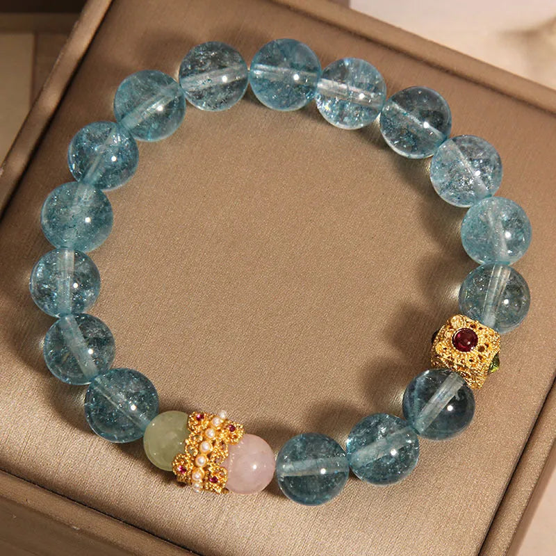 Women's Chinese style crystal bracelet with blue cube sugar beads and colourful stones on flexible ring