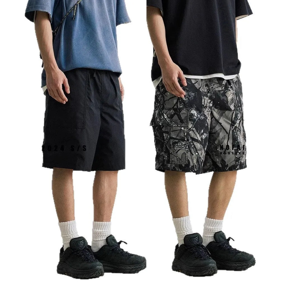 Men's loose fit denim shorts in army green with an elasticated waistband and straight leg.