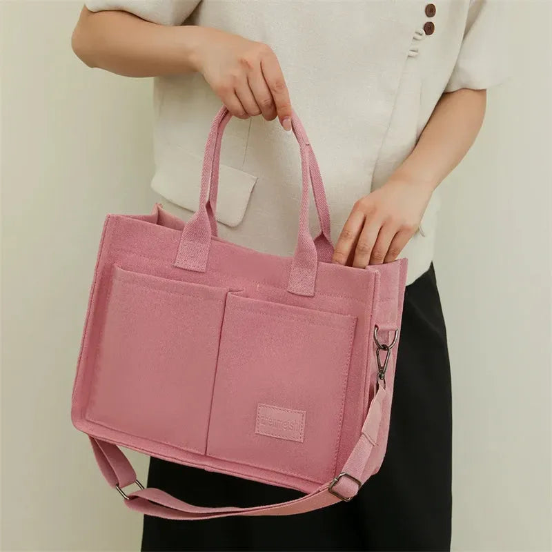 Large capacity canvas tote bag for women with multiple pockets and crossbody strap in creamy white