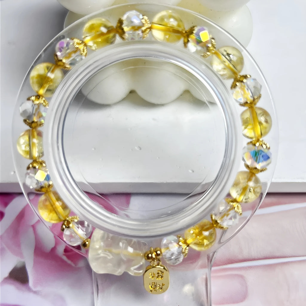 Handmade citrine crystal bracelet with a detailed nine-tail fox charm on a gold-toned chain.