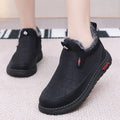Women's black casual flat boots with a round toe and low-top synthetic leather upper.