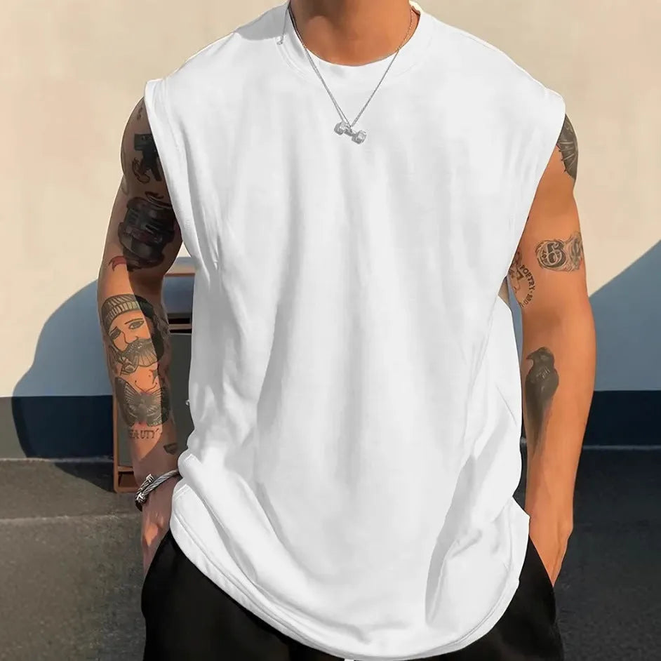 Men's loose fit solid colour cotton tank top on a hanger