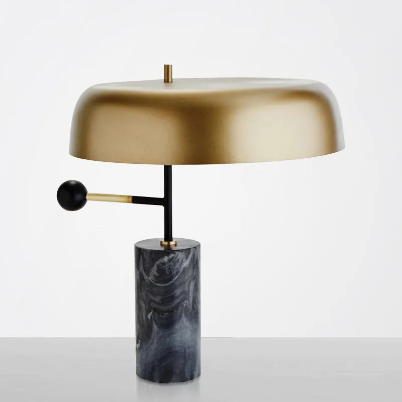 European-style bedside table lamp with warm white lighting on wooden surface