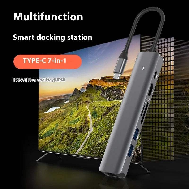 LQT-LH07 7-in-1 USB-C PD charging and card reader hub for laptops on a desk.