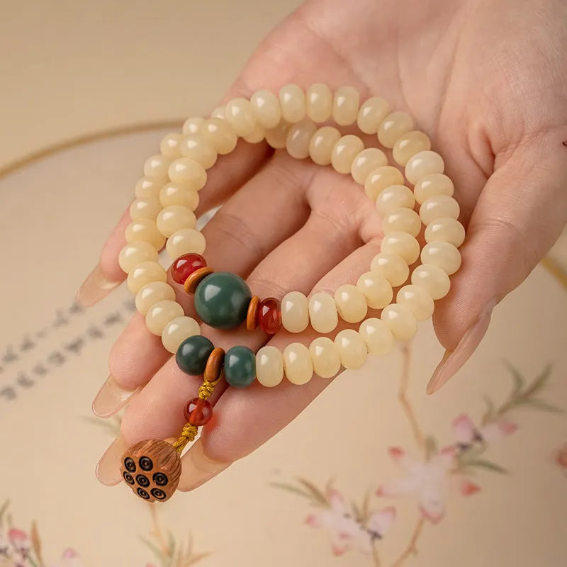 Cream topaz wooden bodhi bracelet with 6 by 9mm flat round beads for women