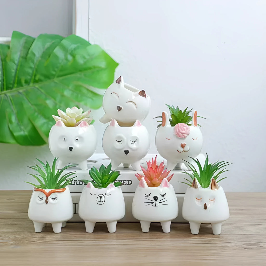 Hand painted ceramic succulent flowerpot with cartoon animal design in pastoral style.