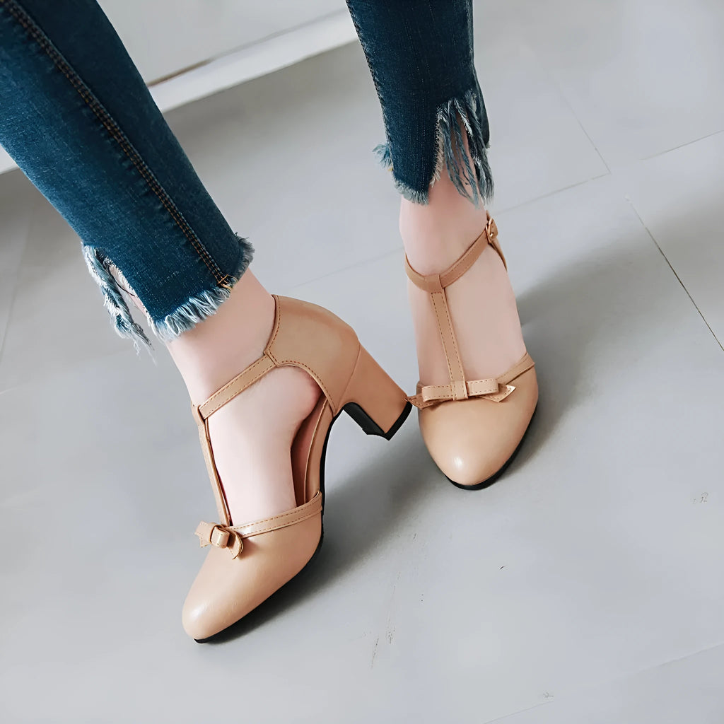 Women's platform sandals with chunky 6.5cm heel, hollow-out pattern and decorative bow detail