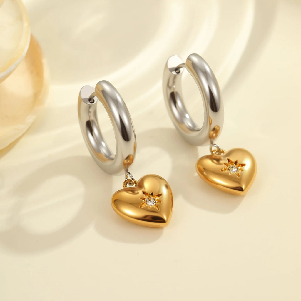 Women's stainless steel Christmas tree and heart earrings with electroplated finish showing geometric shapes