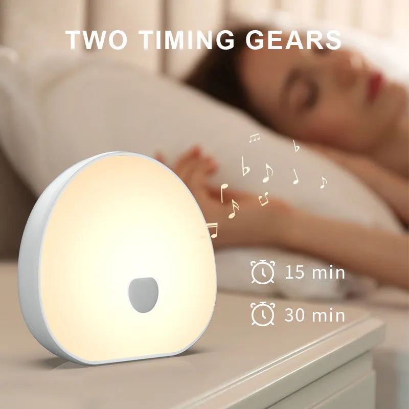 White rechargeable baby night feeding comforter with music function and sleeper unit