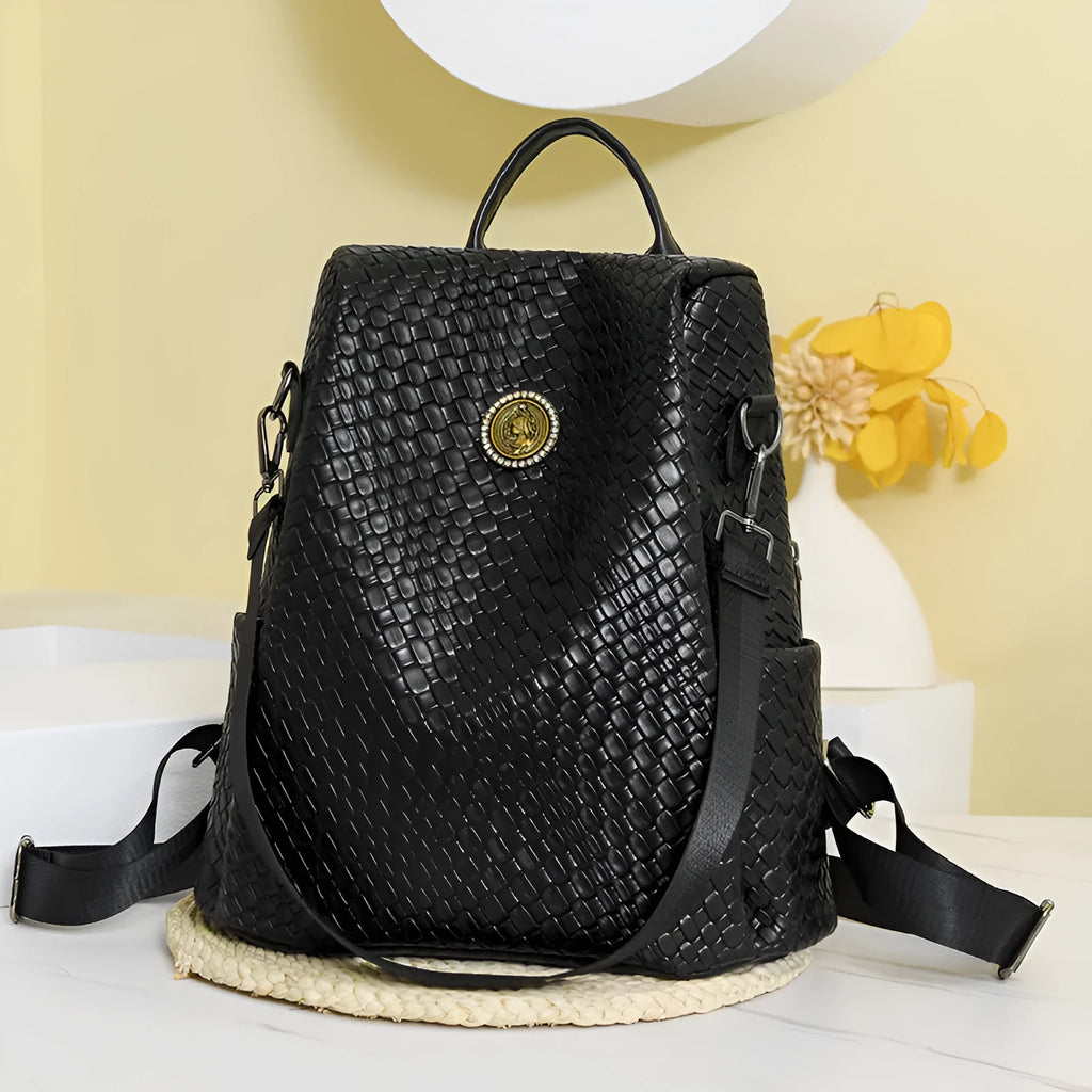 Women's black anti-theft backpack with organisational compartments and urban design details