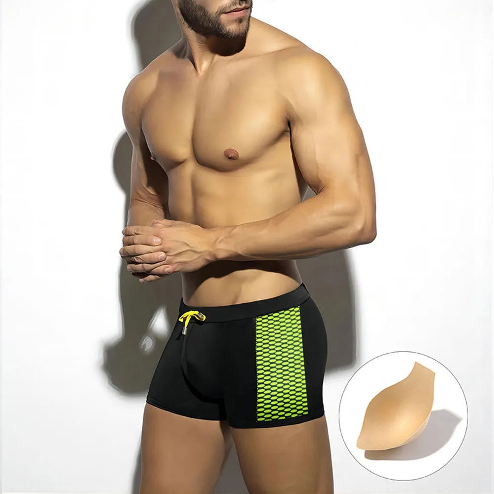 Men's polka dot print quick-dry swimming boxers in black, dark blue, and yellow colour options.