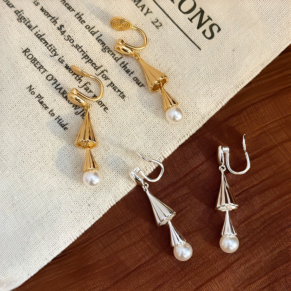 Gold geometric fringe ear clip earrings with long wind chime mosquito coil plate design on copper base