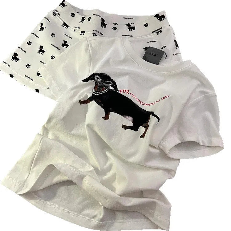 Girls short sleeve pyjama set with sausage dog print and sunglasses design in polyester