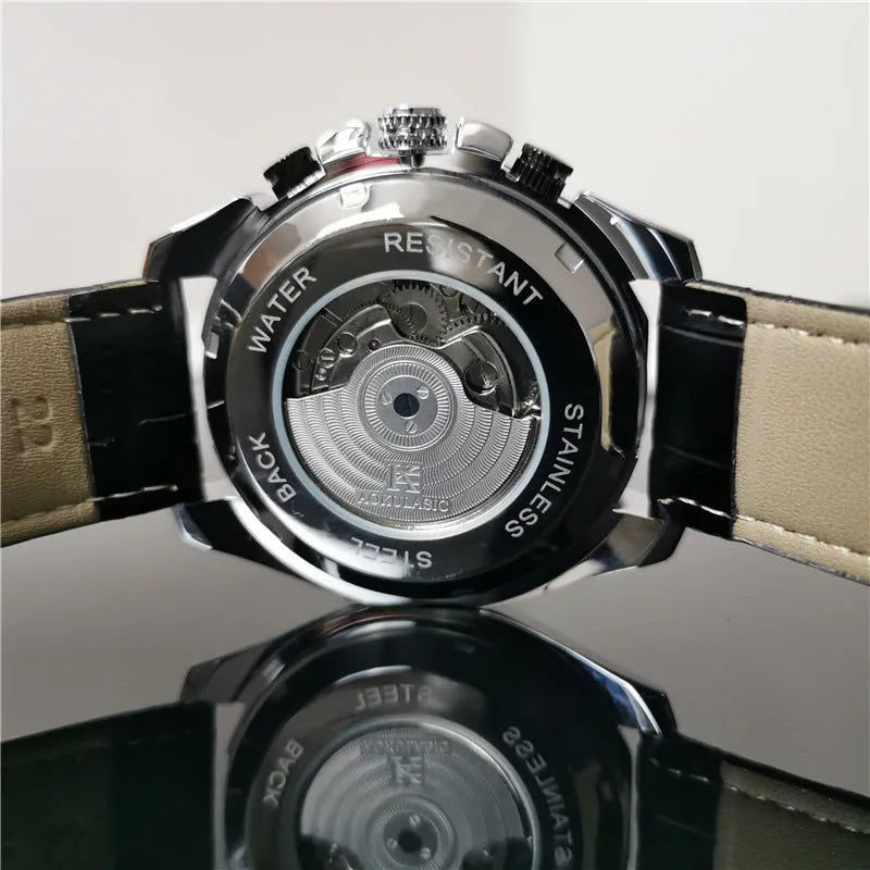 Men's automatic mechanical watch showing multifunction dial on a 12mm thick case in a silver and black colour variant.