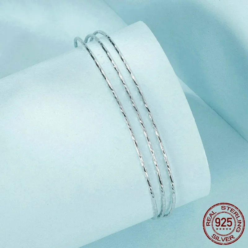 Simple multi-layer 925 sterling silver open-ended bracelet in electroplated colour SCB273 on light background