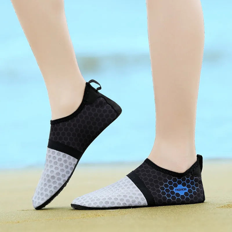 Unisex mesh beach shoes in blue with rubber sole, flat heel, and round toe