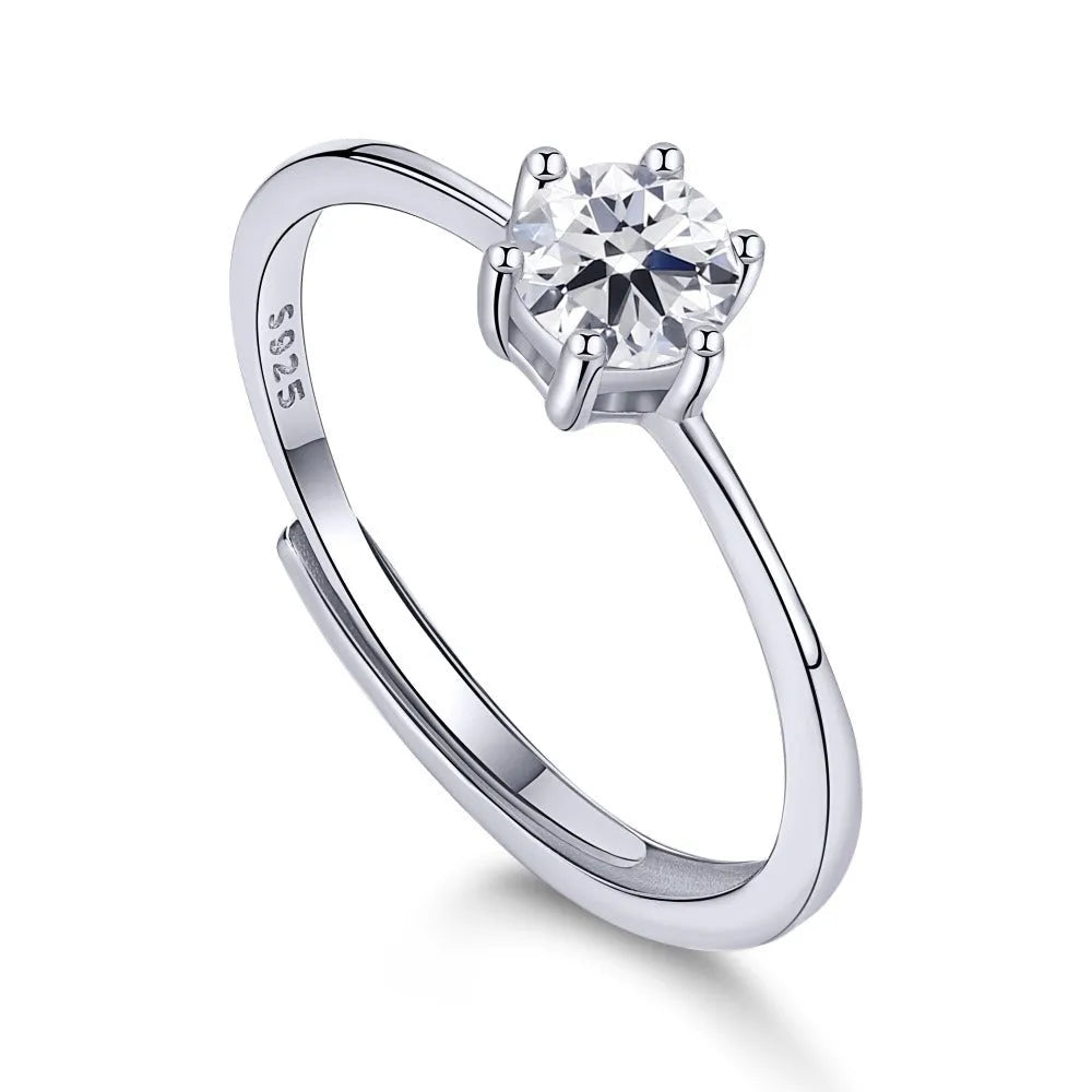 Sterling silver adjustable ring with round zircon in six-claw setting, open mouth band, geometric design