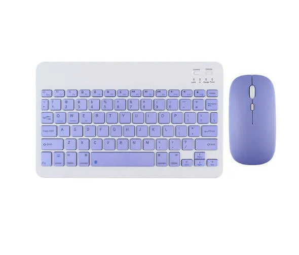 Bluetooth keyboard and matching rechargeable mouse set in elegant pink colour on a desk next to a tablet.