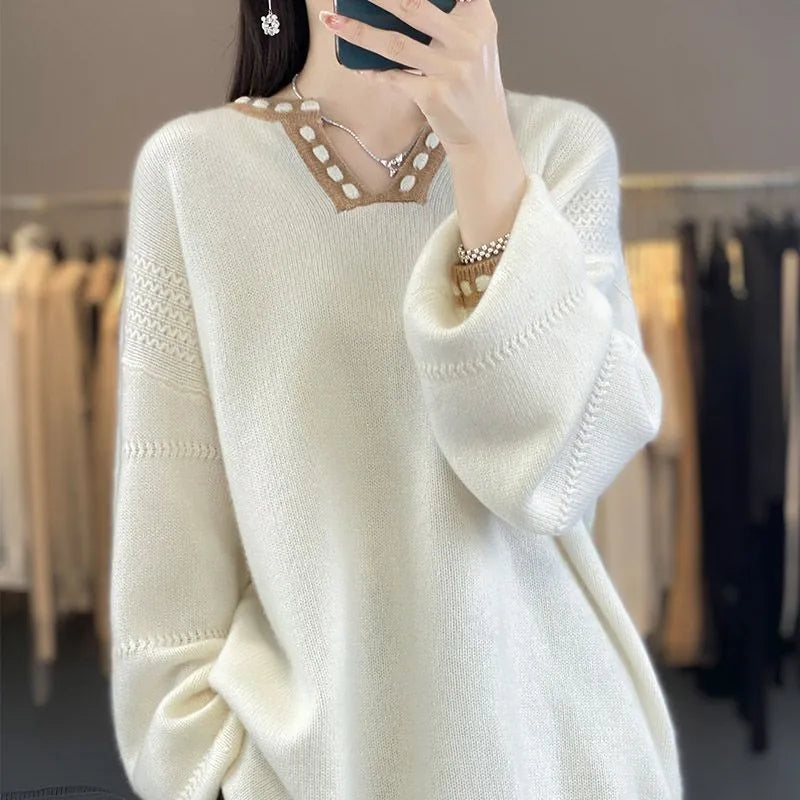 Women's white V-neck viscose pullover sweater showing long sleeves and regular fit.