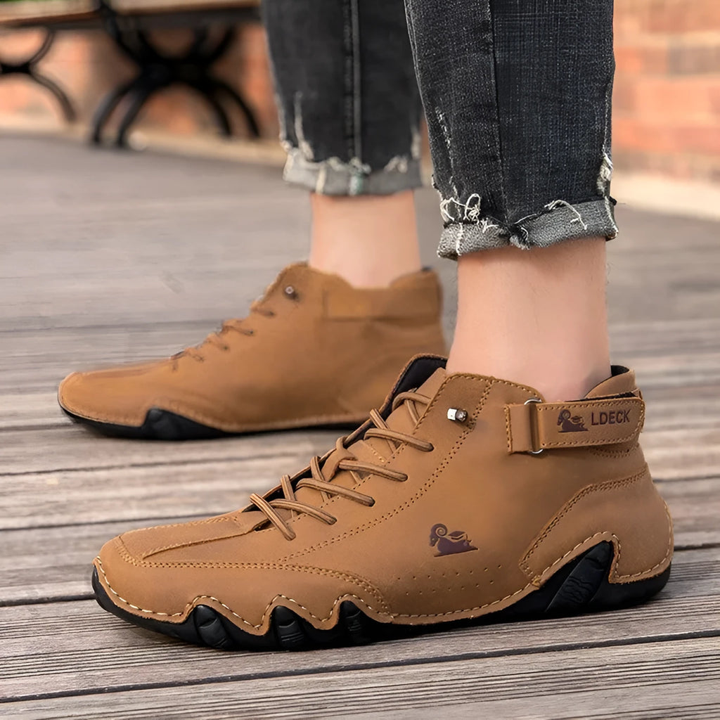 Men's khaki high-top ankle boots with round toe and flat heel on a white background.